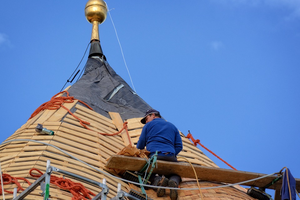 man doing a roofing repair